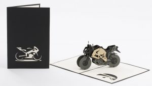 Pop up motorcycle greeting card: A 3D black motorcycle popped up