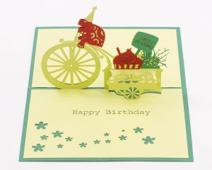 Birthday pop up card: Turtle on a Bike delivering happy birthday greetings and gifts(inside)