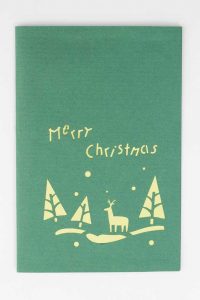 3D pop up greeting cards, Cover of Christmas card showing a deer walking in snowy woods.