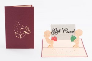 3D pop up greeting cards. Card open , two children standing holding gift card of your choosing.Cover and open