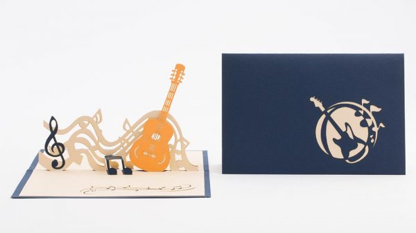 3D pop up greeting cards, card open showing a guitar with music notes. cover and open