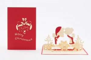 3D pop up greeting cards, Card open Mr and Mrs Clause pop up kissing with gifts, trees and snowflakes.cover and open