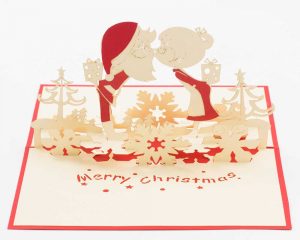 3D pop up greeting cards, Card open Mr and Mrs Clause pop up kissing with gifts, trees and snowflakes.