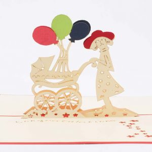 Pop up Baby greeting card: A new mother pushing a baby stroller with a red,green and blue balloons.