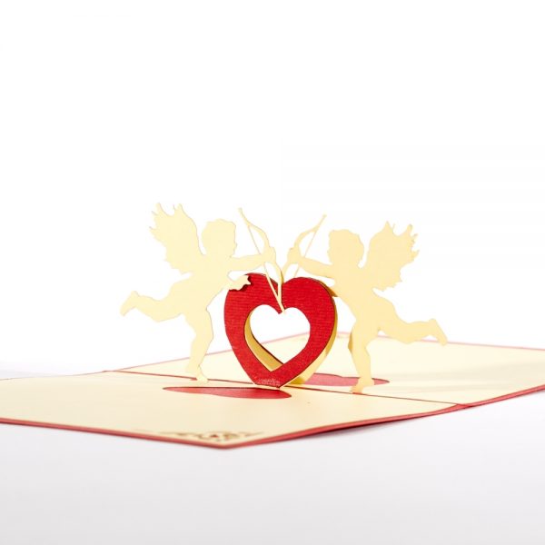 Valentines 3D pop up card: Two cupids stretched over a heart touching bows together.