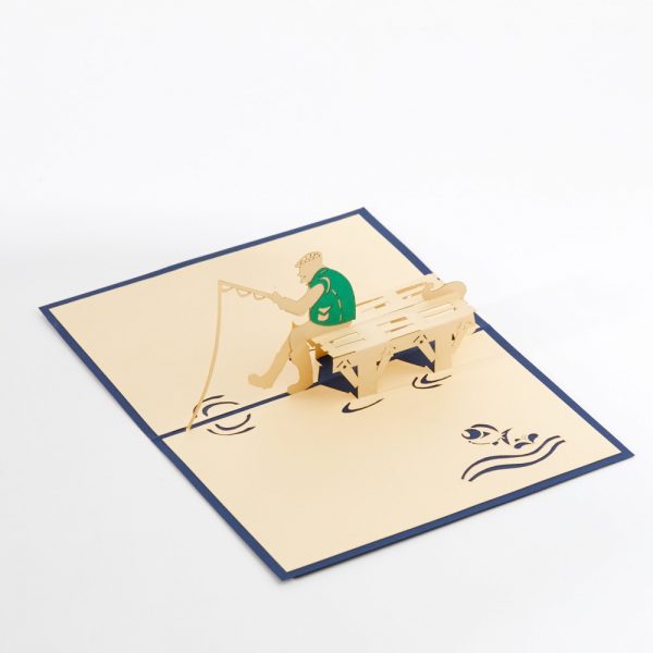 Fishing pop up greeting card: A angler sitting on a bench fishing.