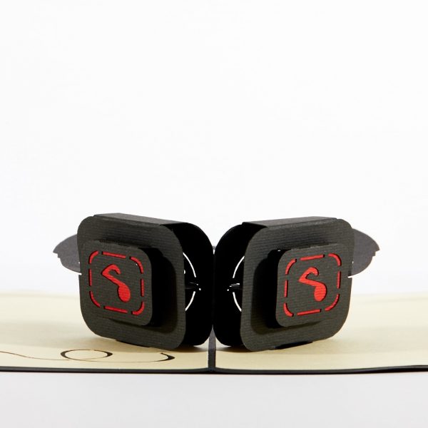 Headphones 3D pop up greeting card: Black and red set of modern headphones popped up.