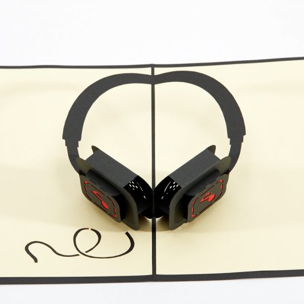 Headphones 3D pop up greeting card: Black and red set of modern headphones popped up.