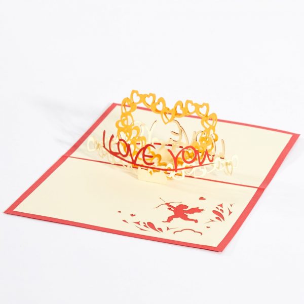 Valentines Day pop up card: A 3D heart made of little hearts with I love You across the base.