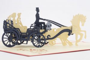 Wedding pop up greeting card: A horse drawn carriage with a bride and groom riding inside.