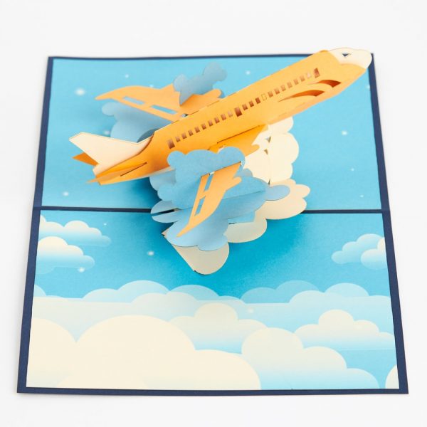 Pop up greeting card: A 3D model of a jet flying through clouds.