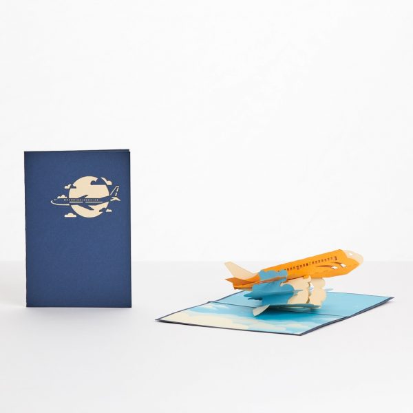 Pop up greeting card: A 3D model of a jet flying through clouds.
